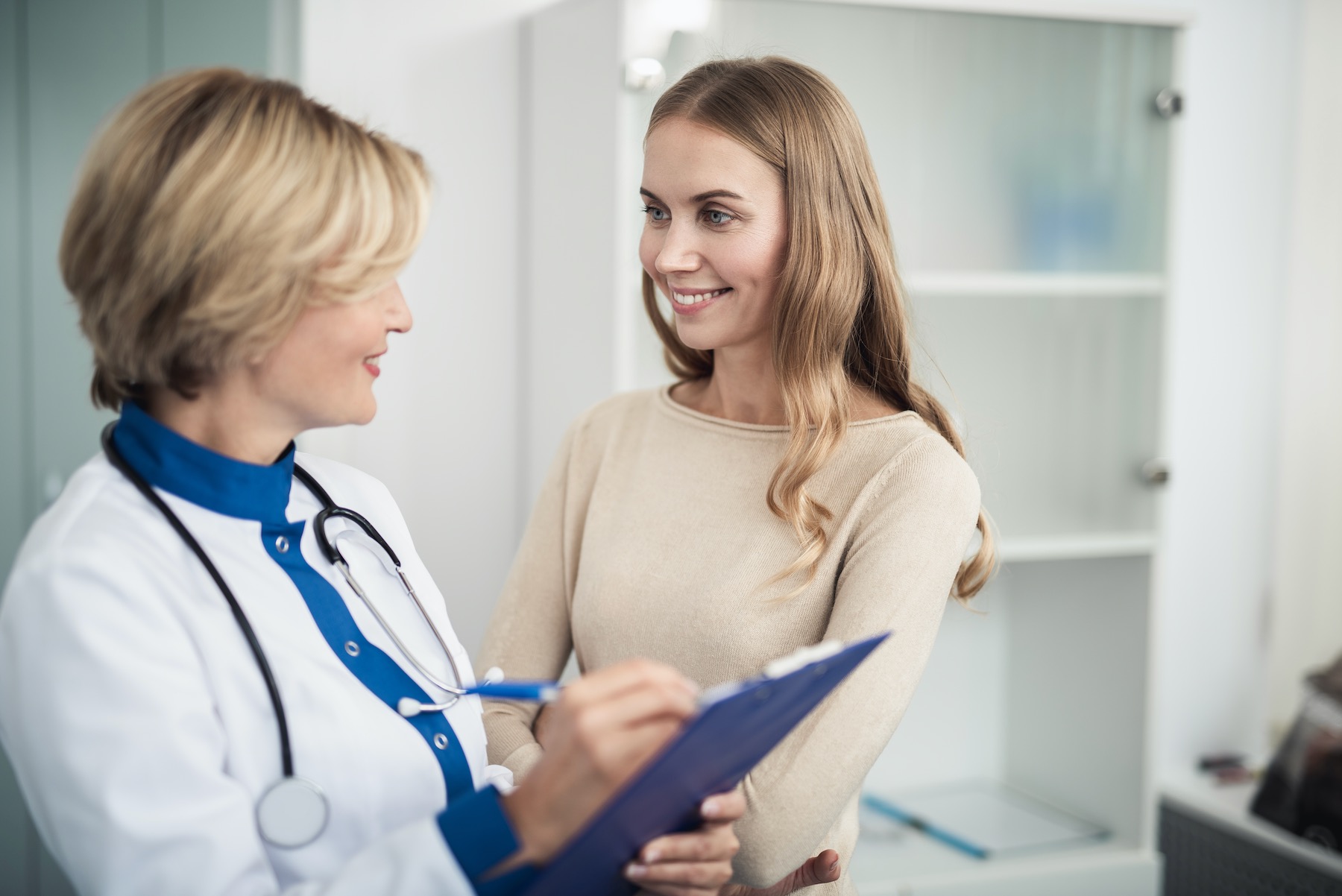 Surgery Scalpel In The News Woman Talking With Surgeon About Options
